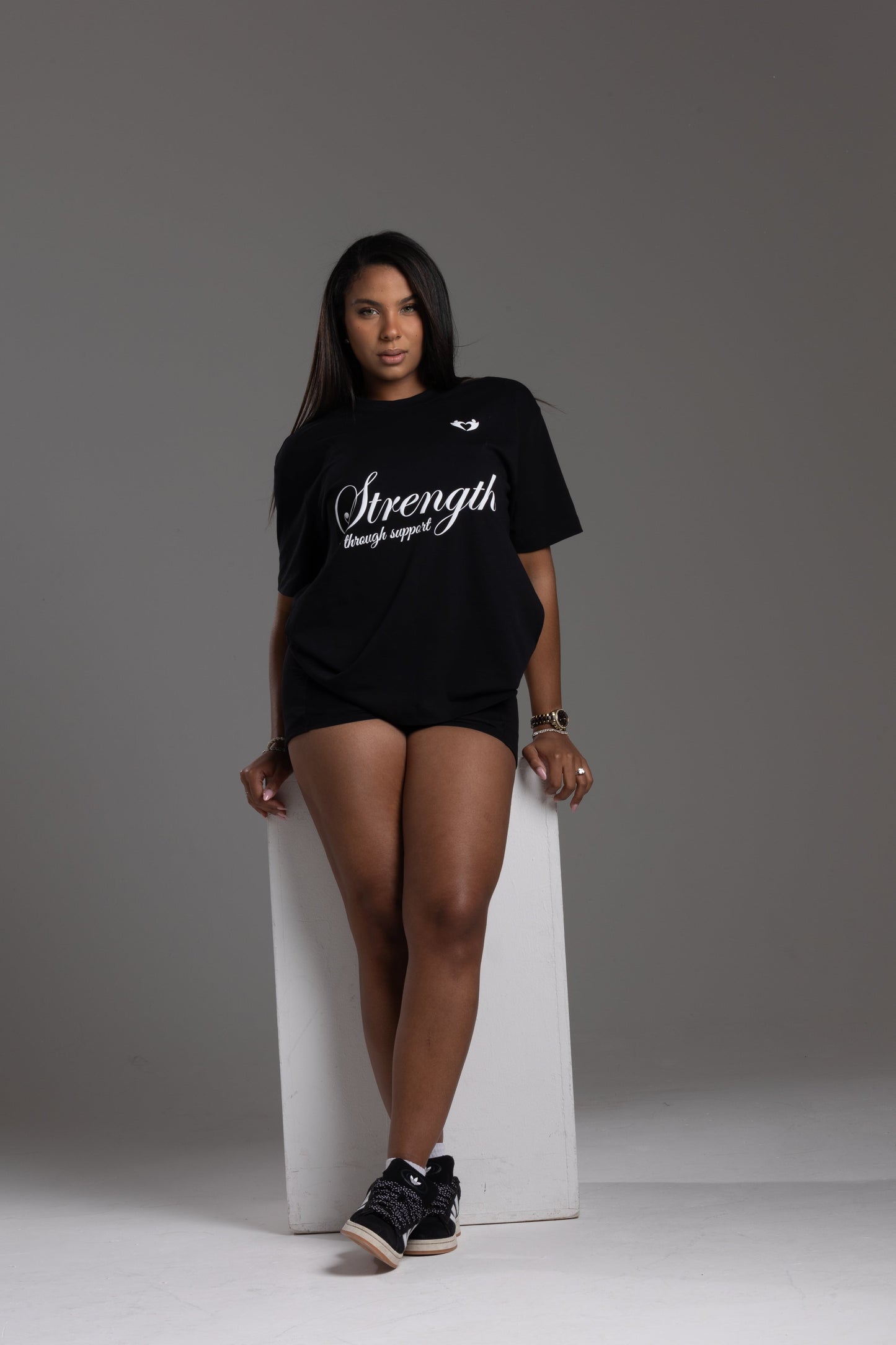 Strength Through Support” T-Shirt – We Hold A Hand Edition