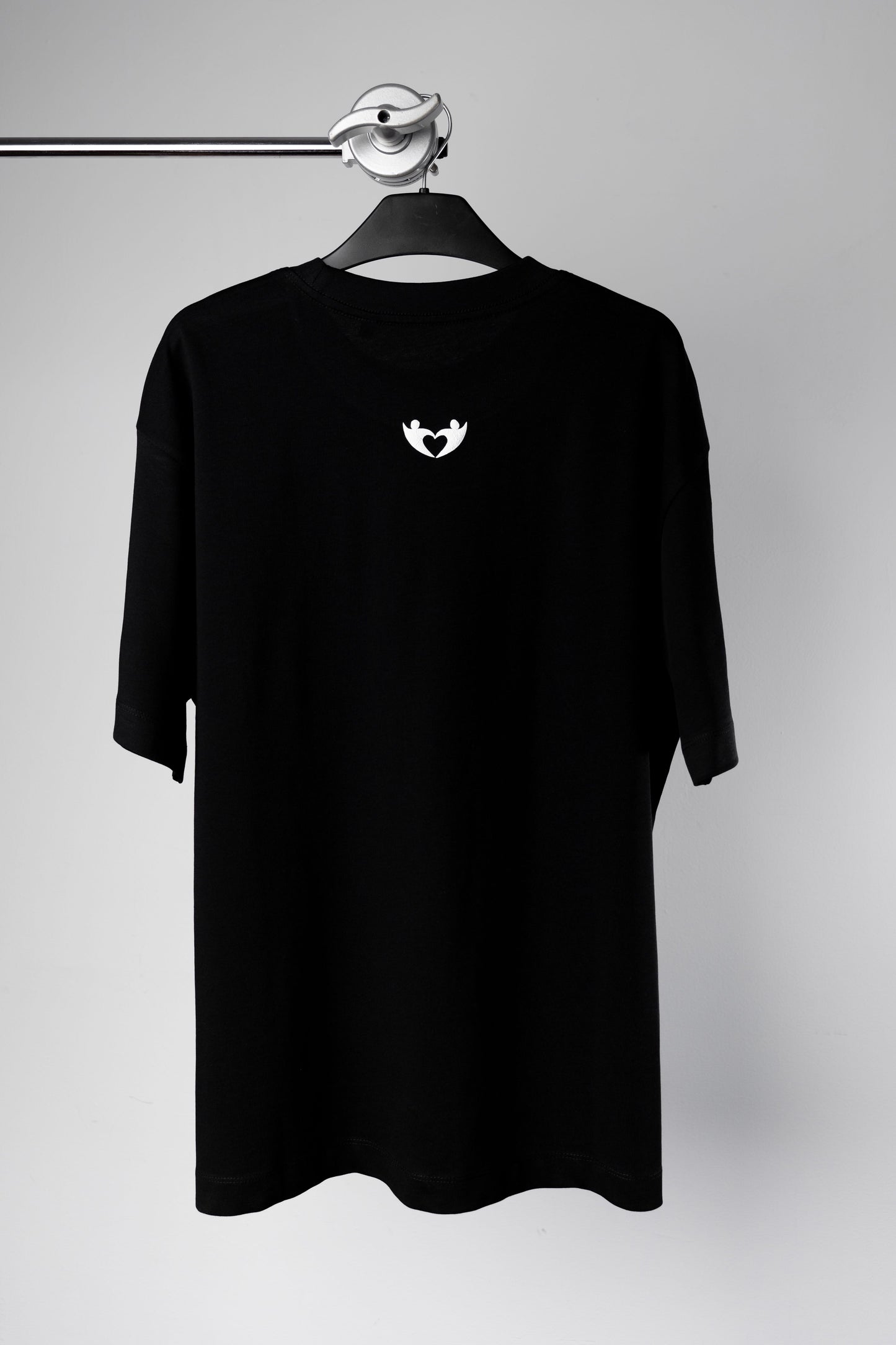 Strength Through Support” T-Shirt – We Hold A Hand Edition
